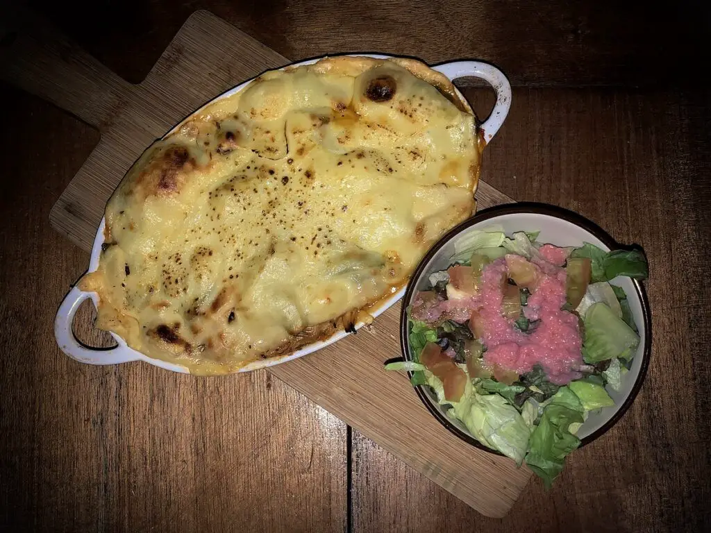 Keshi Yena and salad at Bistro de Suikertuin in Oranjestad, Aruba