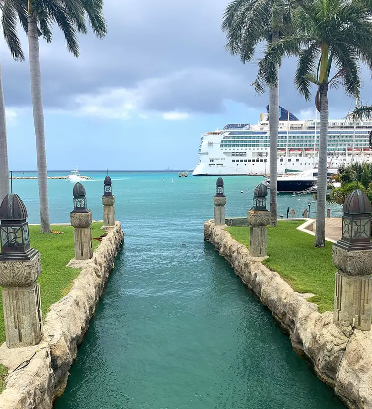 A cruise ship anchored at the cruise terminal in Oranjestad, Aruba