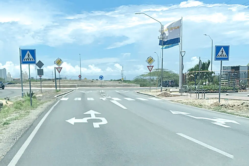 roundabout with lane direction signs in Aruba